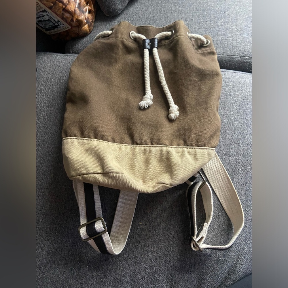Canvas, backpack bag, brown, and khaki with a drawstring enclosure T27